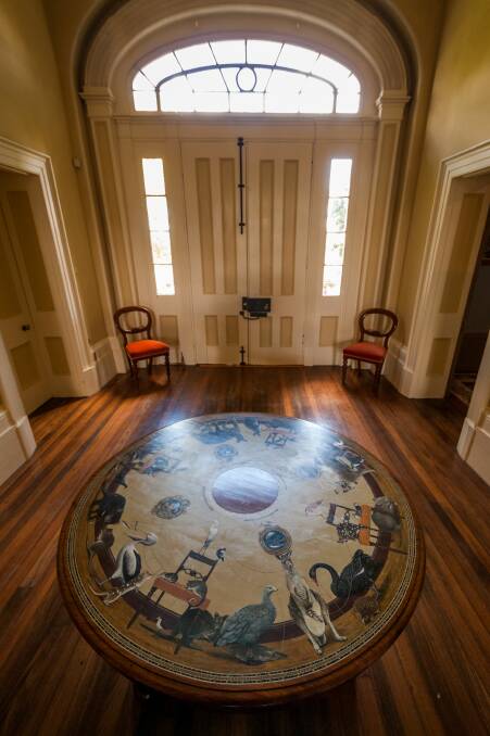 The grand entrance-way at Clarendon house, featuring a Michael McWilliams painted table.