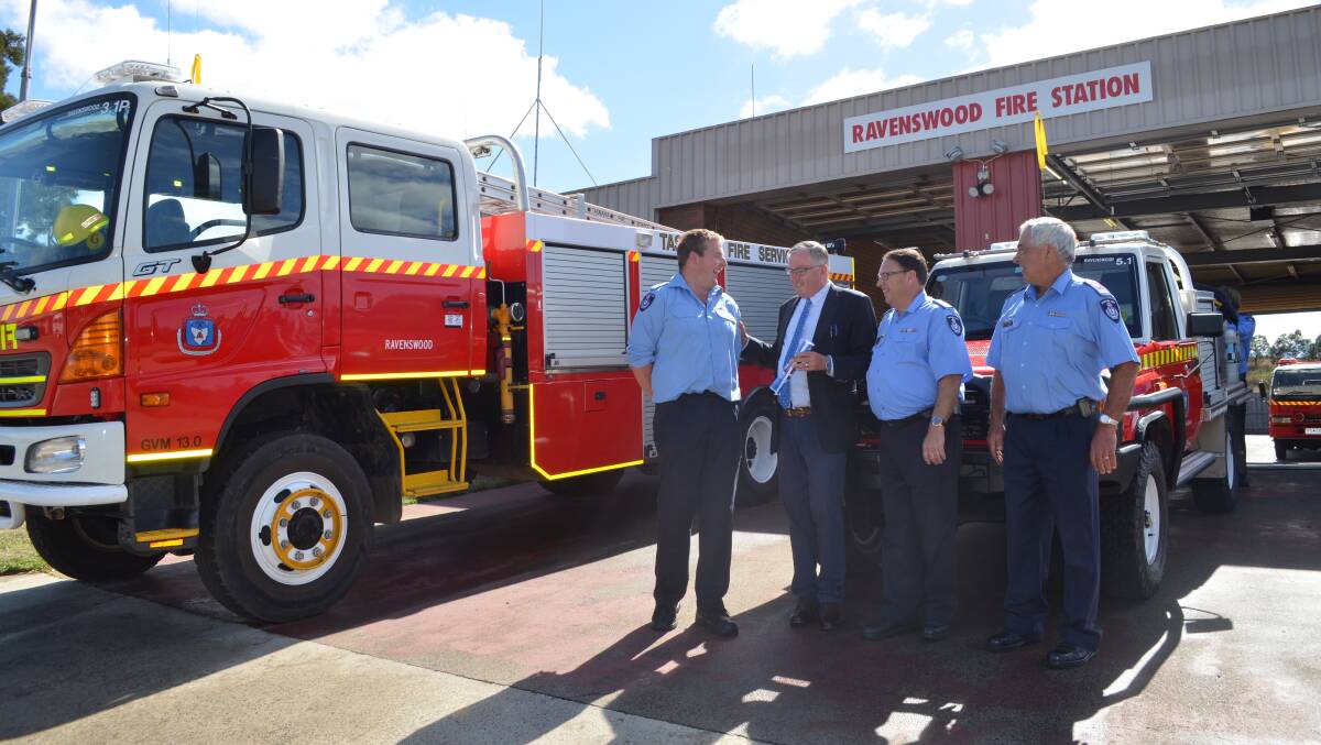 Ravenswood station officer Matt Elphinstone, Police, Fire and Emergency Management minister Rene Hidding, TRVFA state president Andrew Taylor and TVFBA president Robert Atkins, at Thursday's announcement. Picture: Jessica Willard 