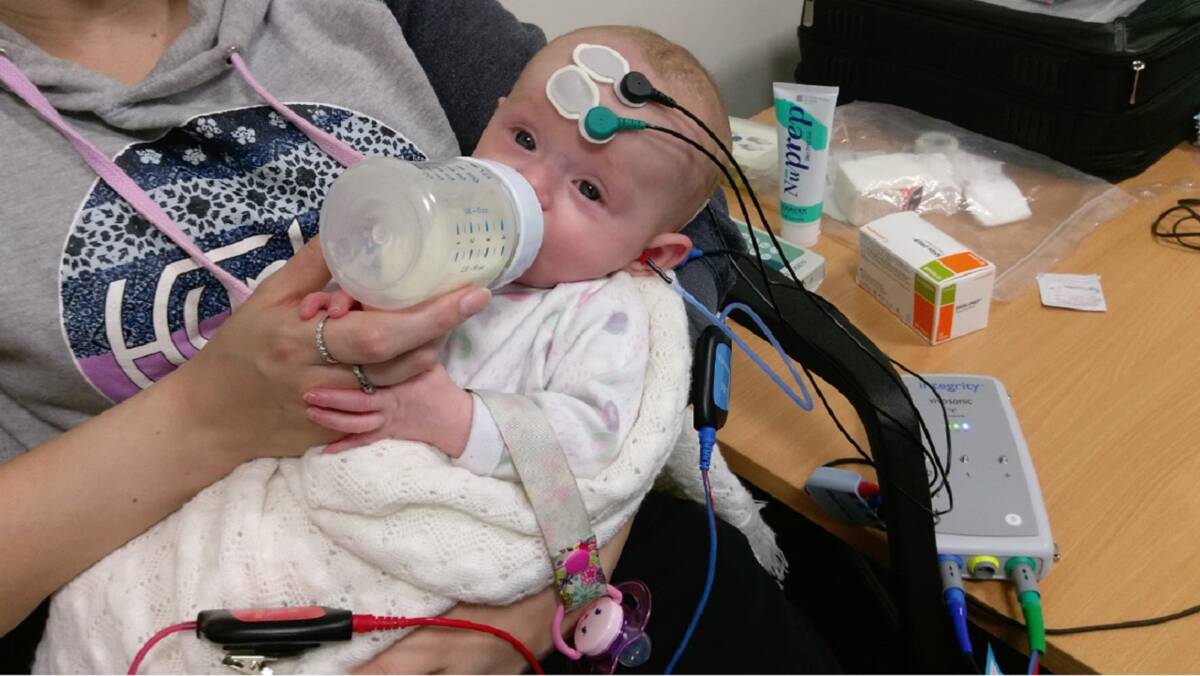 BRAVE: Young patient Phoebe Green undergoing diagnostic testing in Launceston. Picture: Supplied 