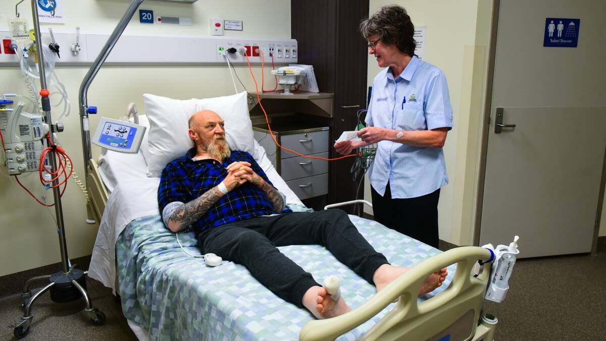CARE: Greg Gillies is cared for by Launceston General Hospital nurse practitioner Clarissa Young during Wound Awareness Week. Picture: Neil Richardson