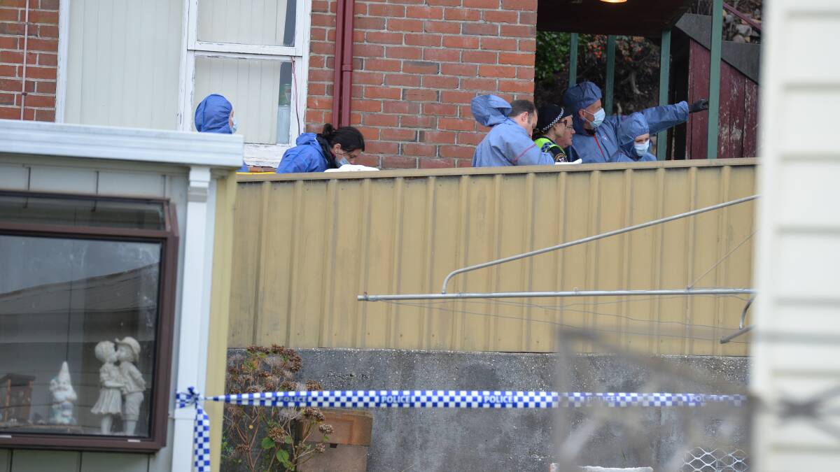 Police continue their investigations into a fatal shooting at Cooee last night. Picture: Brodie Weeding.