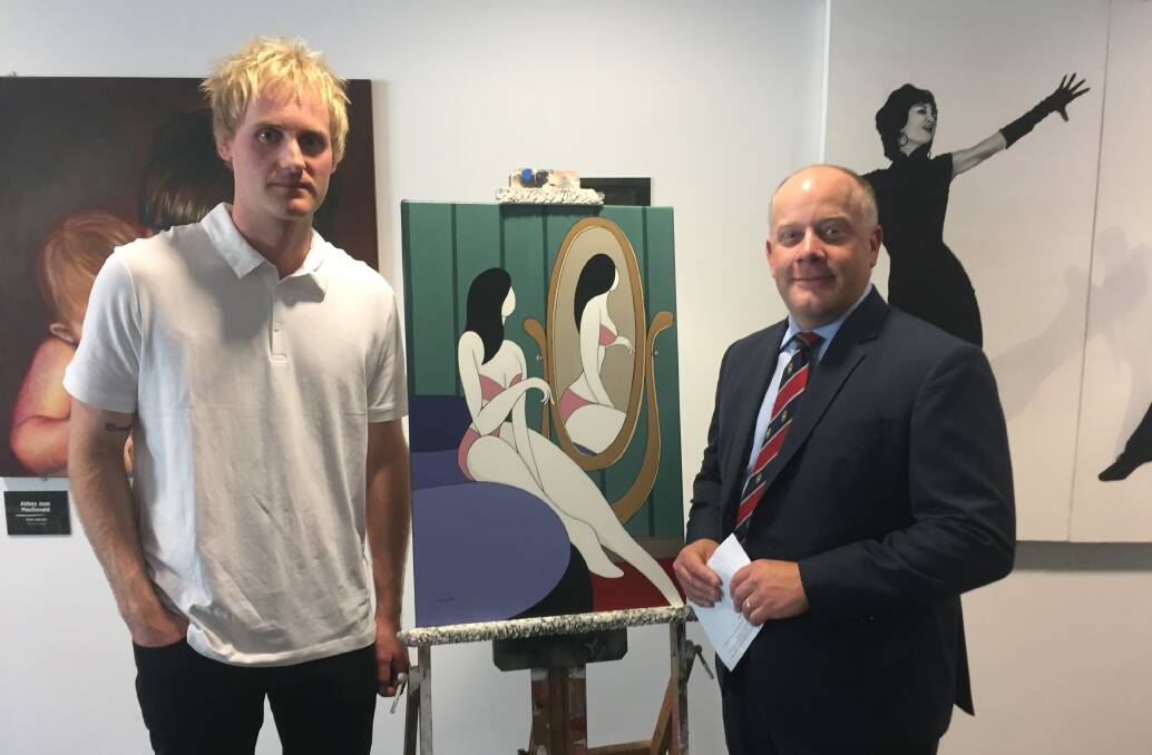 LOOKING BACK: Hobart artist Hilton Owen and RACT Insurance chief executive Trent Sayers with one of Mr Owen's works at the launch of this year's prize.