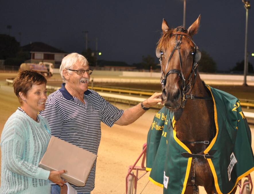 MELTON RUNNER: Riverboat Jasper with Devonport club president Claire MacDonald and Scottsdale owner Wayne Campbell after a win in the NWTLHA Cup in March. Picture: Greg Mansfield