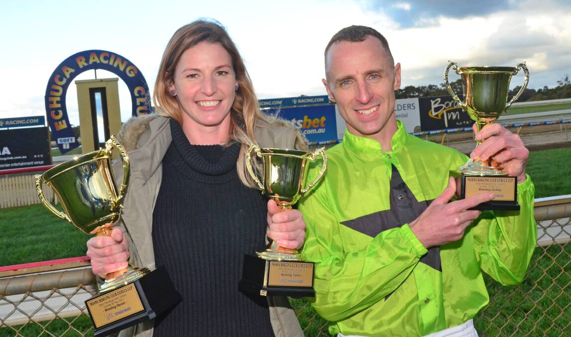 FLEMINGTON BOUND: Co-trainer Imogen Miller and jockey Brendon McCoull with their trophies after Tshahitsi won the $80,000 Echuca Cup. The horse is due to race at Flemington on Saturday. Picture: Getty Images