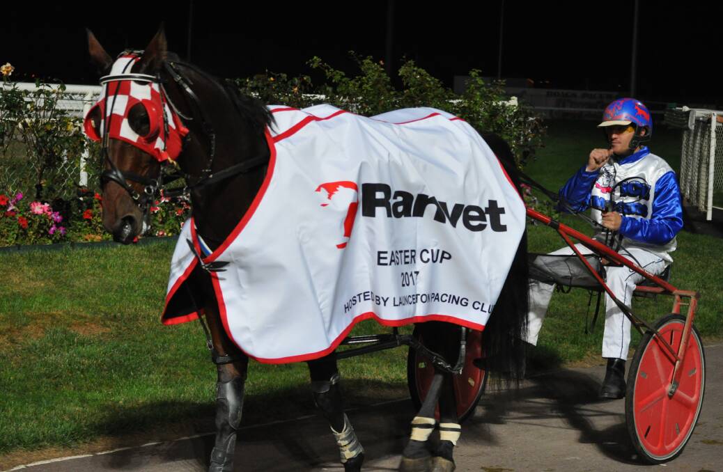 TOO GOOD: Pachacuti and driver Todd Rattray after they overcame a 40m handicap to win the $40,000 Easter Cup. Picture: Greg Mansfield