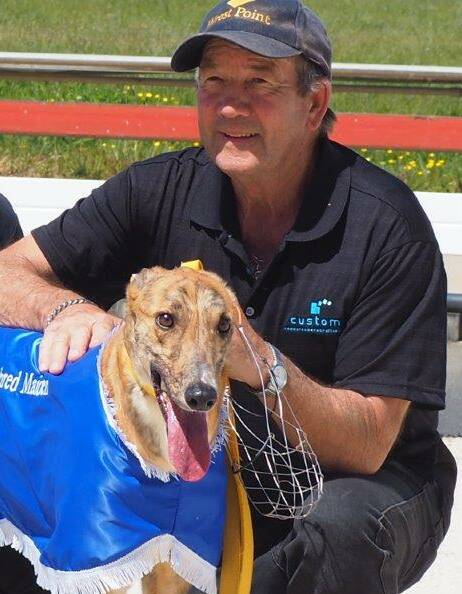 Trainer Butch Deverell with smart greyhound Reiki Master