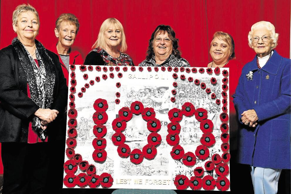 RSL Launceston Women's Auxiliary members Gail Wright, Heather Millins, Dianne Brezski, Ann Cash, Carol Cunningham and Hazel James with some of the 500 poppies they have knitted to mark Anzac Day. Picture: SCOTT GELSTON