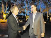 Incumbent Meander Valley Mayor Craig Perkins is congratulated by challenger Andrew Connors. Picture: SCOTT GELSTON