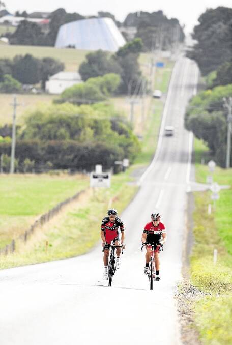 4-2-2016 pic Scott GelstonRichie Porte BMC's Richie Porte and Tasmanian triathlete Hayden Armstrong go one a training ride through North East Tasmania