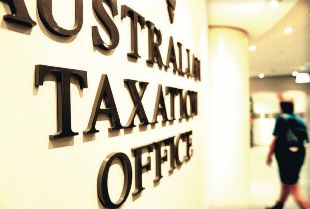 iTax: The Australian Tax Office has announced a mass rollout of Apple devices to middle-tier staff. Photo: Louie Douvis