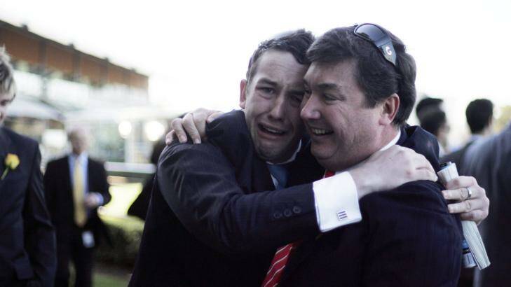 Appeal: Dean Watt (right, with son Adam at Rosehill in 2010) will appeal for fine over internet domain names. Photo: Jenny Evans