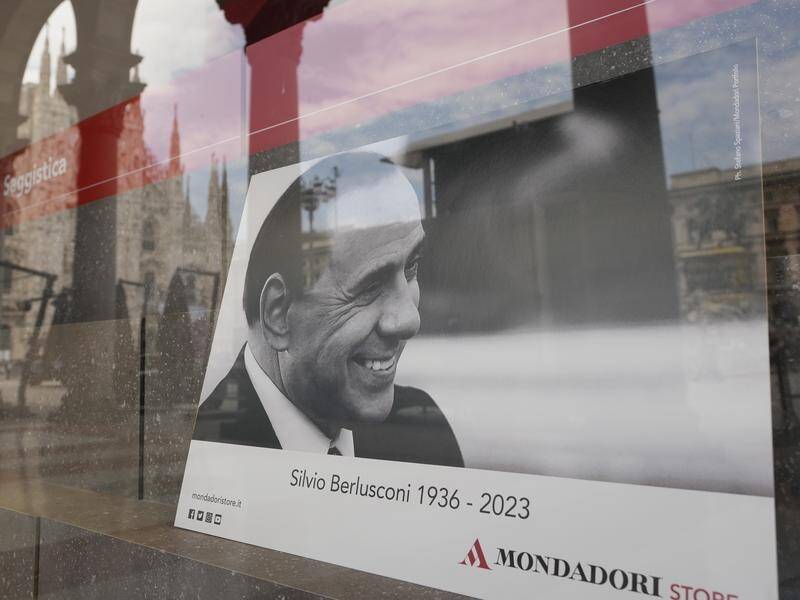 Forza Italia says a stamp will be available on the first anniversary of Silvio Berlusconi's death. (AP PHOTO)