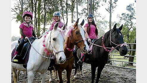 Tasmanian Equine Endurance Riders Association's James King, 7, Jen Clingly and Sarah Parker will be among many to participate in a pink endurance ride for breast cancer next month.