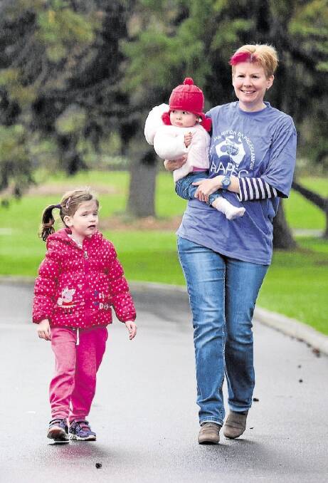 Belinda Rees with daughters Jessica, 4, and Chloe, 18 months, prepare for the Pre-eclampsia Awareness Walk on Sunday. 