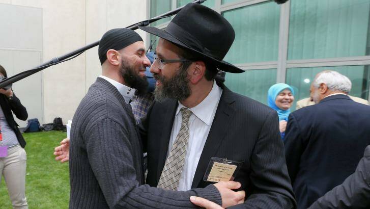 Sheikh Wesam Charkawi and Rabbi Zalman Kastel greet each other at the event. Photo: Alex Ellinghausen