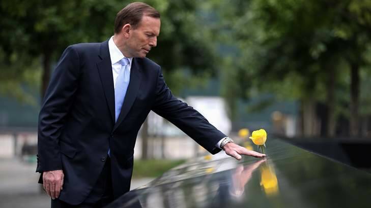 Prime Minister Tony Abbott visited the 9/11 Memorial in New York pausing at the names of Australian victims. Photo: Andrew Meares