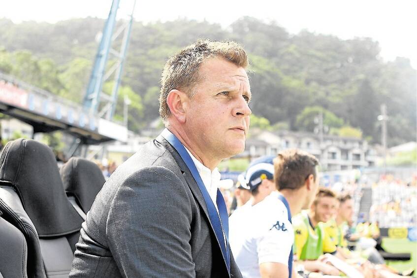 Tony Walmsley, interim coach of the Mariners, watching last weekend's A-League match between the Central Coast Mariners and Melbourne City FC.