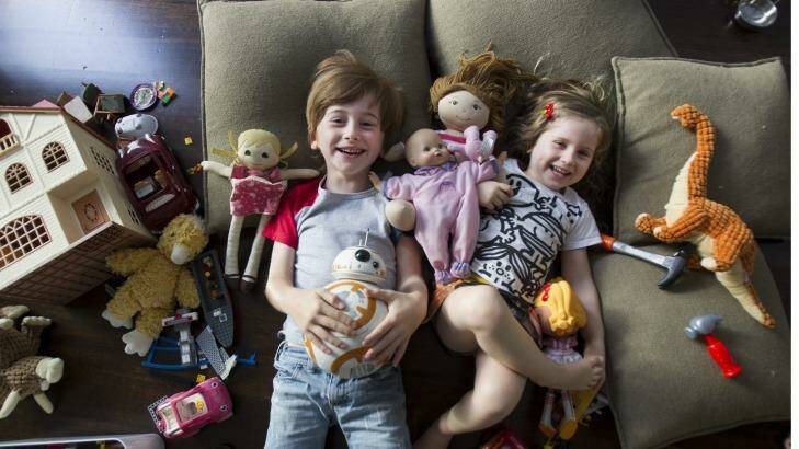 Spencer Howley, 7, and his sister Saffron, 4, play with their toys in the family home in East St Kilda.  Photo: Simon O'Dwyer