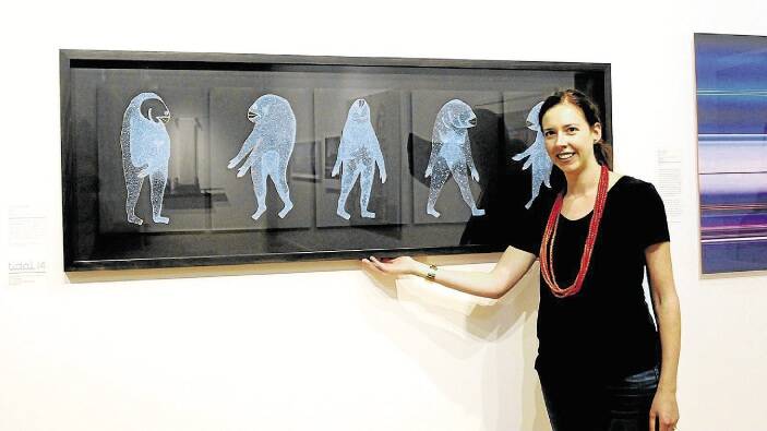 Dianne Sheehan at Devonport Regional Gallery with winner of City of Devonport Art Award, Galaxias by Joel Crosswell.