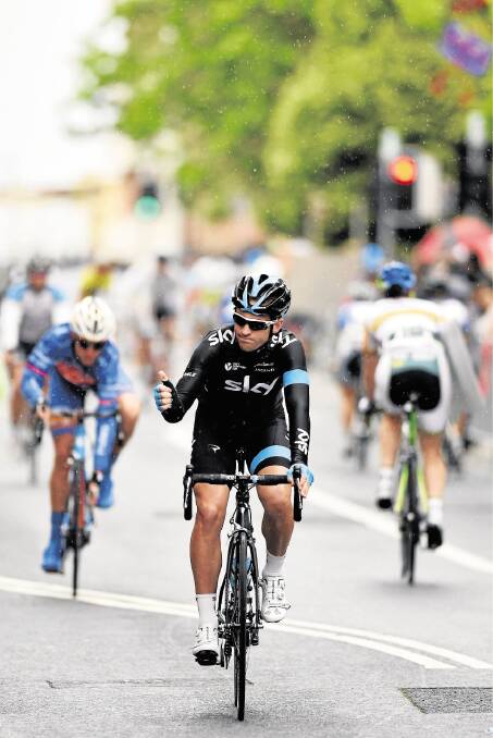 Nathan Earle acknowledges the crowd at the Launceston Cycling Classic last December.