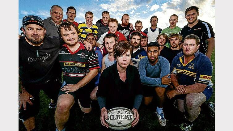 New Launceston Rugby Union Club president Joanne Partridge gets acquainted with the players in her club. Picture: PHILLIP BIGGS.