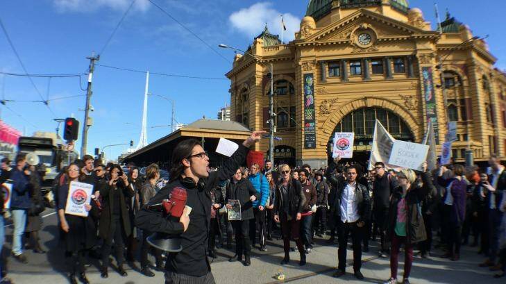 Demonstrators protest against Operation Fortitude in Melbourne on Friday afternoon. Photo: Joe Armao