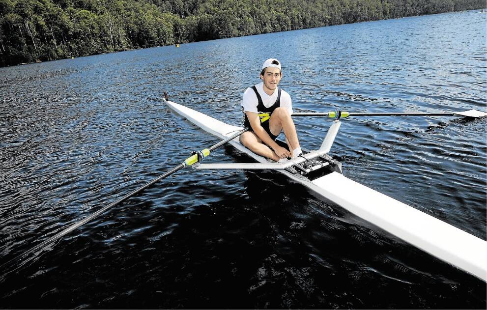 17/01/15 photo by Geoff Robson.story by Phil Edwards.State Rowing at Lake Barrington.Oliver Cook from Tamar heads out to compete and win the u23 single sculls.