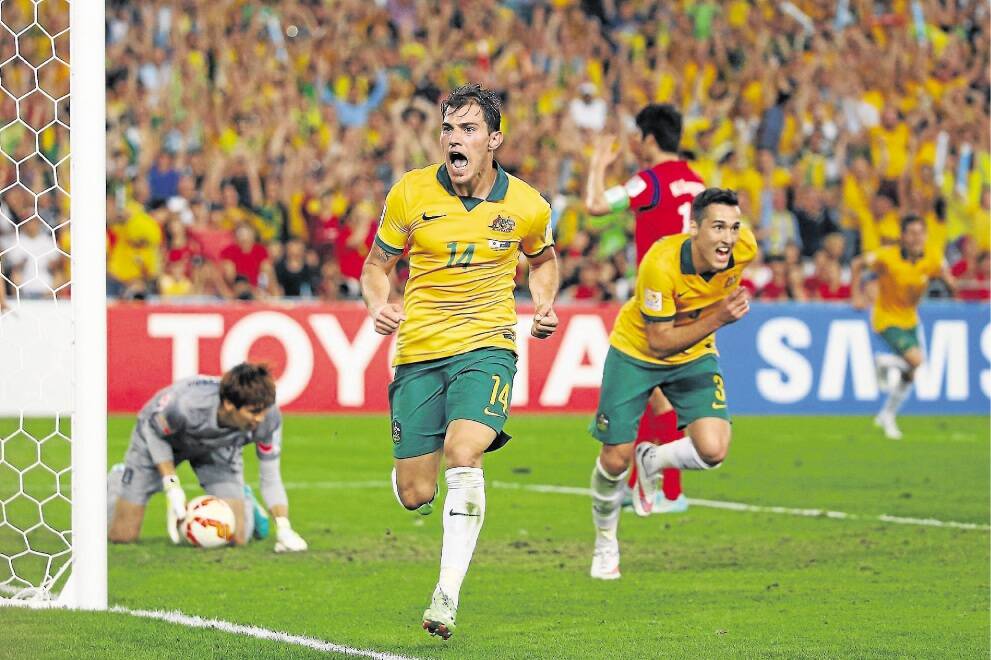 SYDNEY, AUSTRALIA - JANUARY 31:  James Troisi of Australia celebrates after scoring a goal during the 2015 Asian Cup final match between Korea Republic and the Australian Socceroos at ANZ Stadium on January 31, 2015 in Sydney, Australia.  (Photo by Mark Kolbe/Getty Images)