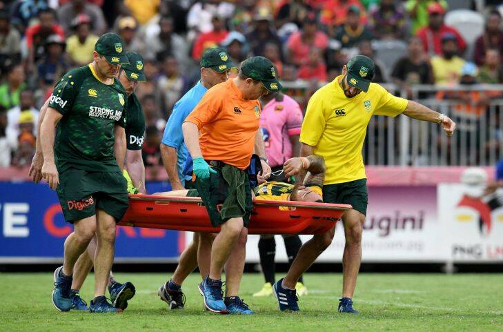 Dylan Walker is taken from the field injured. Prime Minister's XIII vs PNG Kumuls at Port Moresby. Saturday September 23, 2017.