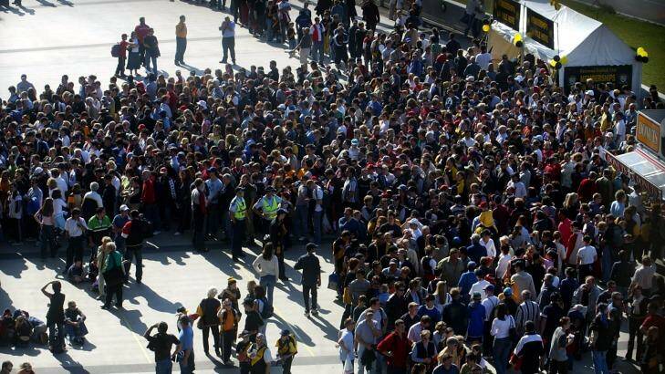 Fans may be forced to wait longer periods before entering AFL grounds. Photo: Sebastian Costanzo