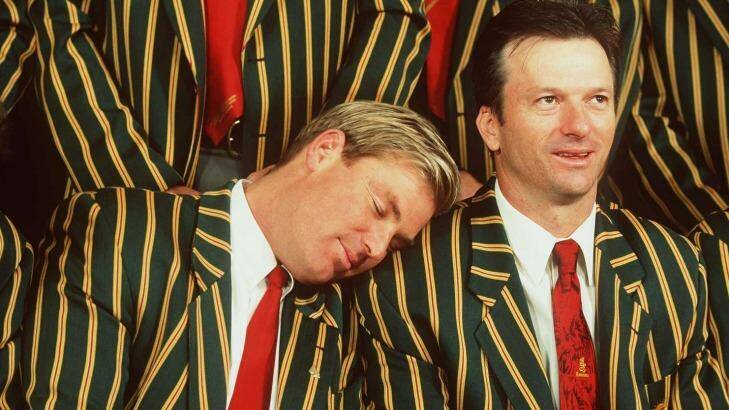 Shane Warne takes a snooze on the shoulder of teammate Steve Waugh, in 1999. Photo: Robert Cianflone, Getty Images