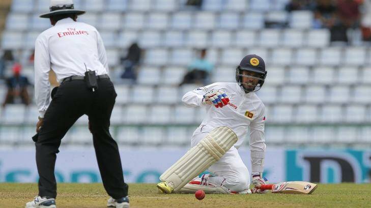 Sri Lanka's Dhananjaya de Silva slips while running between wickets. Photo: Eranga Jayawardena