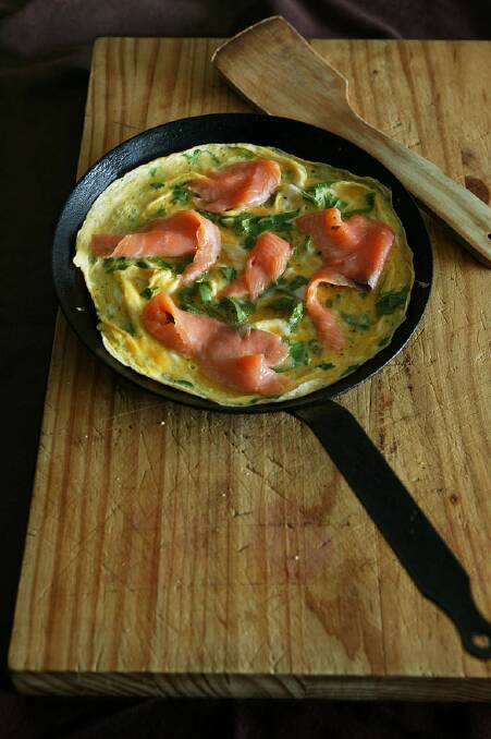 Dinner for one ... Stefano Manfredi's smoked salmon and rocket frittata <a href="http://www.goodfood.com.au/good-food/cook/recipe/smoked-salmon-and-rocket-frittata-20111019-29w02.html"><b>(recipe here).</b></a> Photo: Jennifer Soo