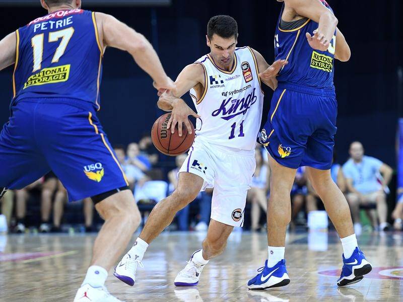 Kevin Lisch has scored 18 points and five three-pointers in Sydney's 17-point NBL win over Brisbane.
