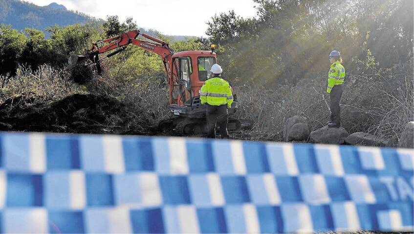 Police prepare to dig in the search for the remains of Lucille Butterworth.Picture: DANIEL McCULLOCH