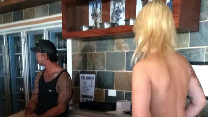 Topless barmaids photographed entertaining soldiers at a government recreation club.  Photo: Supplied