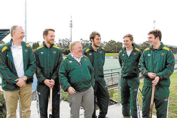 Tassie Tigers team manager Iain Meaney, Julian Vittorio, head coach Glenn Freeman, Jayden Pearson, James Bourke and Jeremy Edwards share a laugh at Monday's team announcement.
