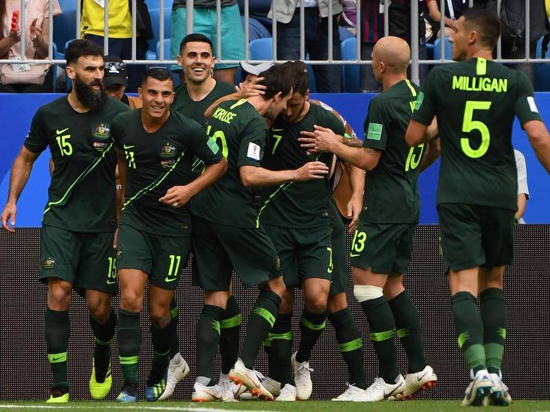 The Socceroos were decked out in their away kit for their World Cup clash with Denmark.