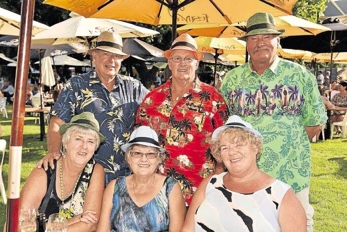 Rob and Susan Hutchings, John and Aileen Popowski and Peter and Pam Keygan of Orford enjoy Festivale on Friday. Photo: Scott Gelston