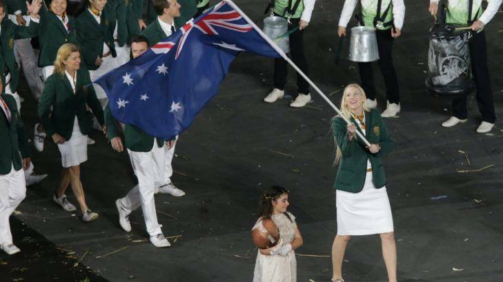 Lauren Jackson carrying the flag for the Australian team at the London Olympics in 2012. She will be at the Rio Olympics in an off-court role. Photo: Brendan Esposito
