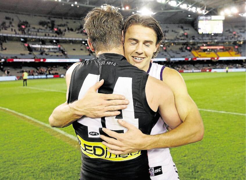 Maverick and Lachie Weller at the end of Sunday's St Kilda v Fremantle match. Picture: Getty Images.
