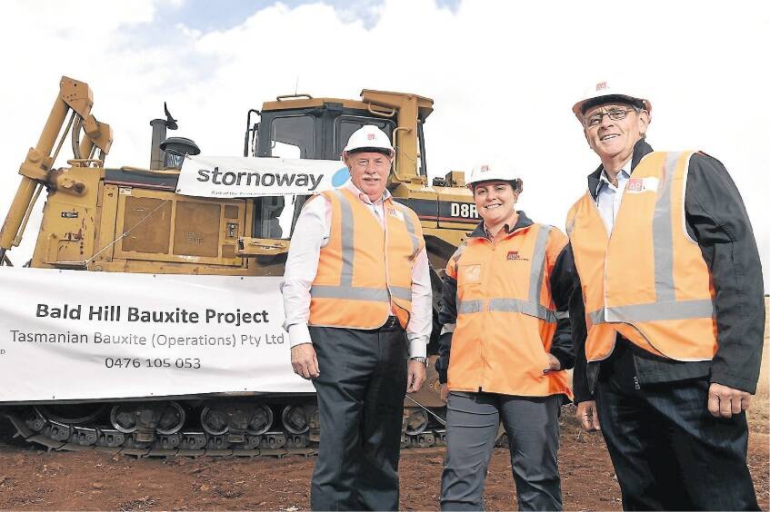 Australian Bauxite Ltd chairman Paul Lennon, project geologist Tamara Coyte and Resources Minister Paul Harriss at the Campbell Town mine opening yesterday. Picture: MARK JESSER