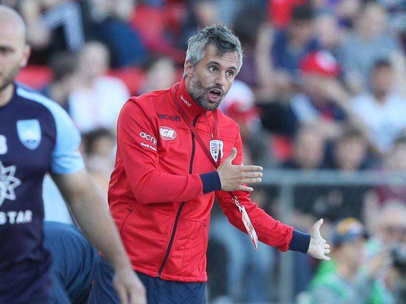 Adelaide United's Marco Kurz is enjoying the pressure on his A-League side to secure a finals spot.