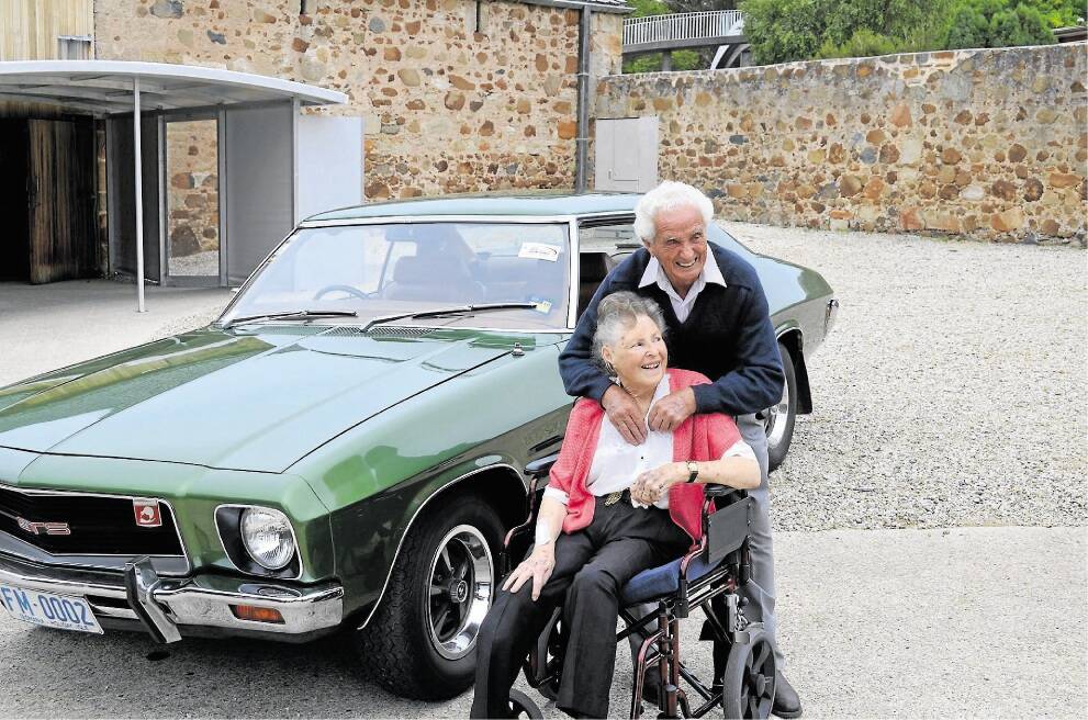 Frank and Sylvia Manley and the green Monaro, which teetered on the edge of the broken Tasman Bridge 40 years ago.