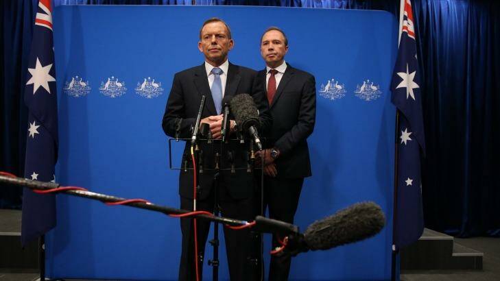 Not our policy: Prime Minister Tony Abbott and Immigration Minister Peter Dutton. Photo: Andrew Meares