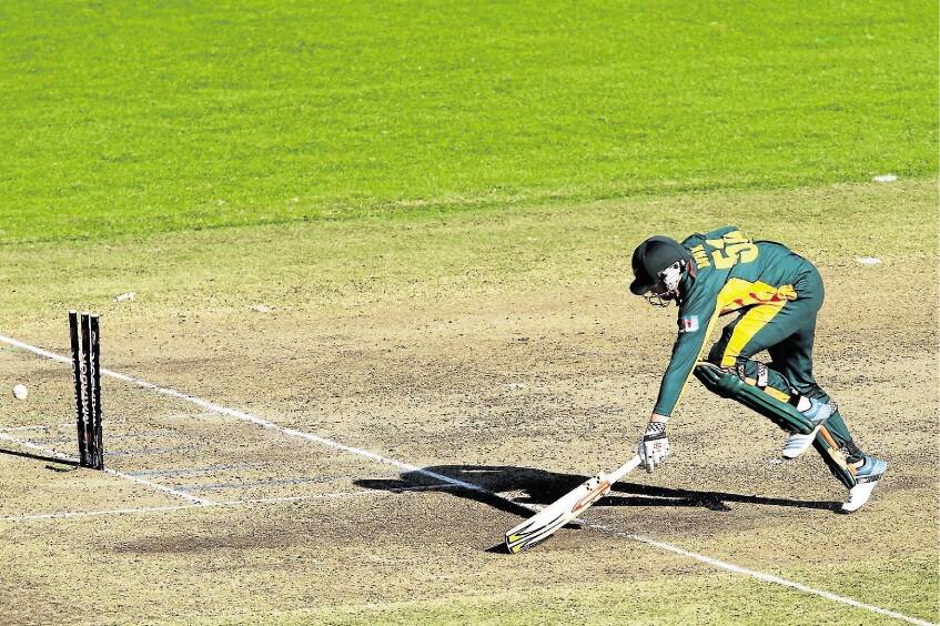 Tasmania's Ben Dunk of the Tigers is runout during the one daymatch between Tasmania and South Australia at North Sydney Oval .