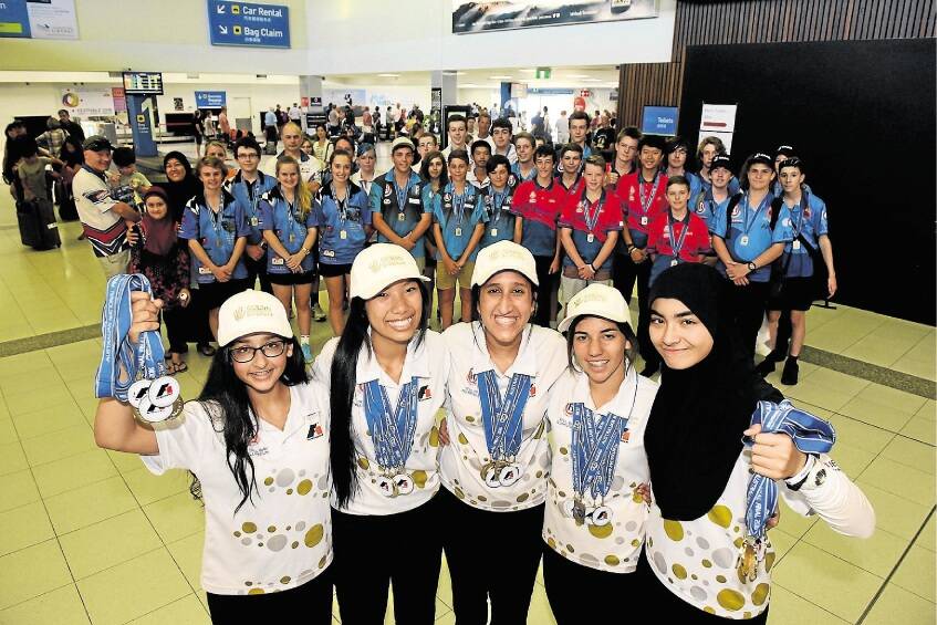 Winning Queechy High students of the Golden Diversity team Eleanor Arumugam, Hoai Nguyen, Yara Alkhalili, Emily Heazlewood and Marayam Ali, with the rest of the students behind. Picture: PAUL SCAMBLER
