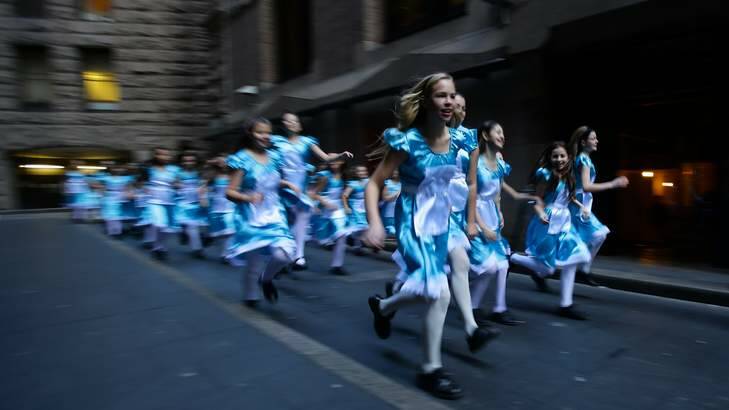 Adventures in the city: Year six students from MLC school who were inspired by Lewis Carroll's classic tale. Photo: Dallas Kilponen