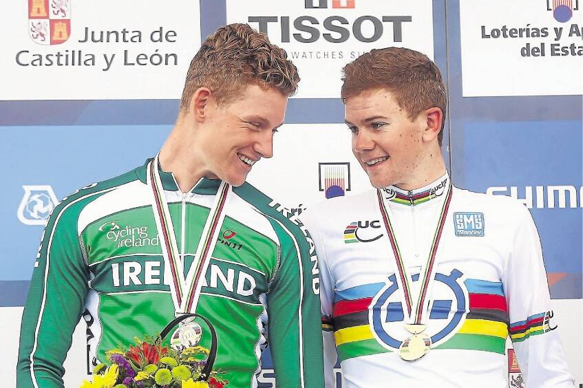 PONFERRADA, SPAIN - SEPTEMBER 22:  Ryan Mullen (2nd) of Ireland chats to race winner Campbell Flakemore of Australia on the podium for the Under 23 Men's Individual Time Trial on day two of the UCI Road World Championships on September 22, 2014 in Ponferrada, Spain.  (Photo by Bryn Lennon/Getty Images)