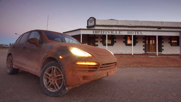 A Porsche Cayenne, which has had a bit of a run in the outback. Photo: Mark Bean